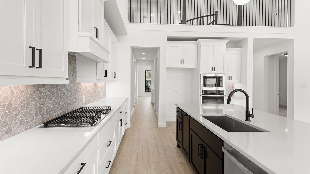 Furnished interior view inside a new home in Lakes of Cane Island, Katy (Image 7).