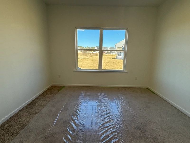 Guest Bed featuring the AW Collection® Coastal - Light-filled and calm, ideal for guests or family.