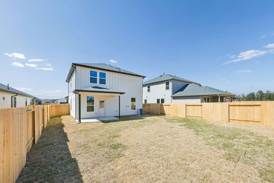 Exterior details and patio area of a home in Montgomery Bend, Montgomery (Image 4).