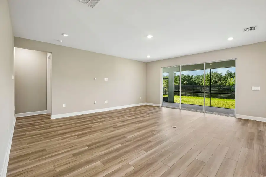 Spacious, unfurnished interior of a new home in Firethorn, Parrish (Image 13).