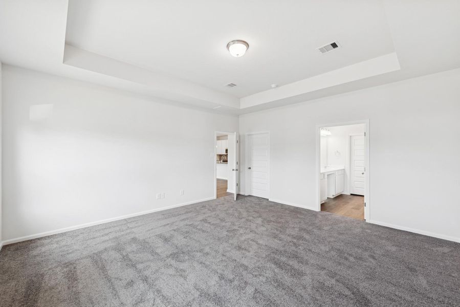 The Crawford- Primary Suite with Tray Ceiling The Crawford- Primary Suite with Tray Ceiling