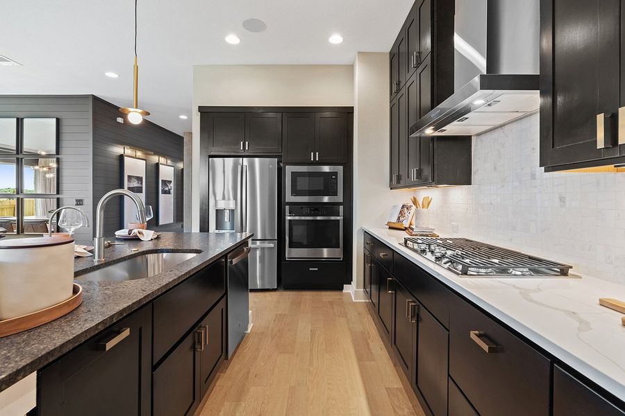 Furnished interior view inside a new home in Park Collection at Lariat, Liberty Hill (Image 18). Furnished interior view inside a new home in Park Collection at Lariat, Liberty Hill (Image 18).