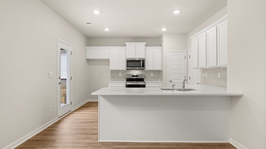 Representative furnished interior of a home built from the Brandon by D.R. Horton in WillowBrook, Winder (Image 6). Representative furnished interior of a home built from the Brandon by D.R. Horton in WillowBrook, Winder (Image 6).
