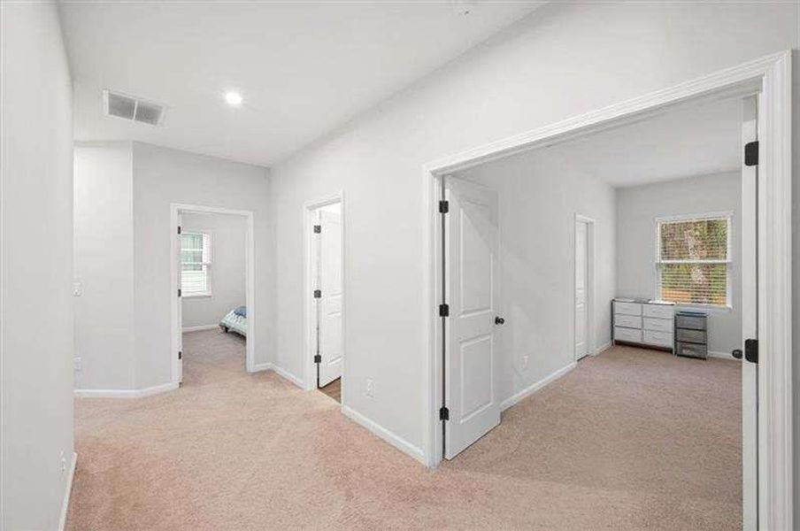 Spacious, unfurnished interior of a new home in Enclave at Edgewater, Holly Springs (Image 21). Spacious, unfurnished interior of a new home in Enclave at Edgewater, Holly Springs (Image 21).