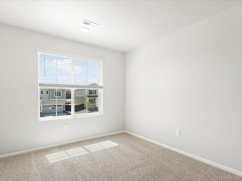 Spacious, unfurnished interior of a new home in Westgate, Greeley (Image 29).