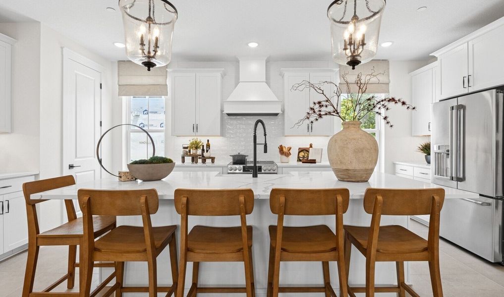 Kitchen with white cabinets and center island Kitchen with white cabinets and center island