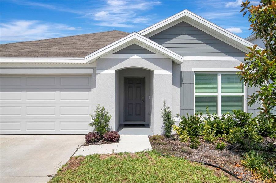 Front exterior of a new home in River Park, Temple Terrace, FL, highlighting curb appeal (Image 27).