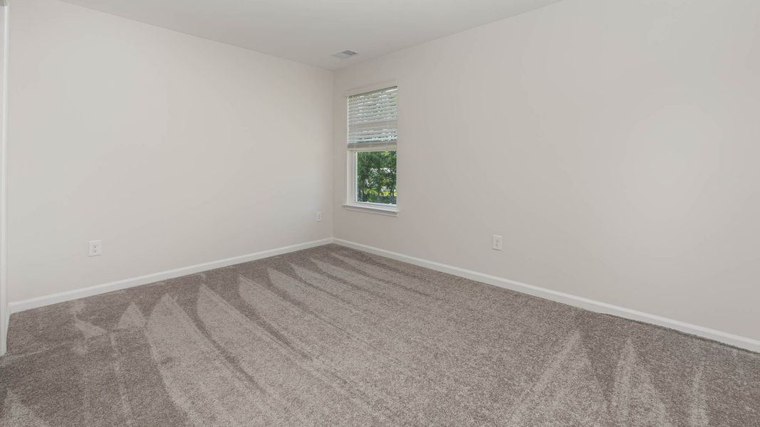 Representative unfurnished interior of a home built from the Wren by D.R. Horton in Cedar Hill Landing, Navassa (Image 31).