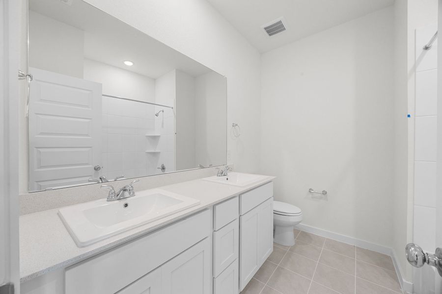Furnished interior view inside a new home in Prairie Winds, Hutto (Image 16).