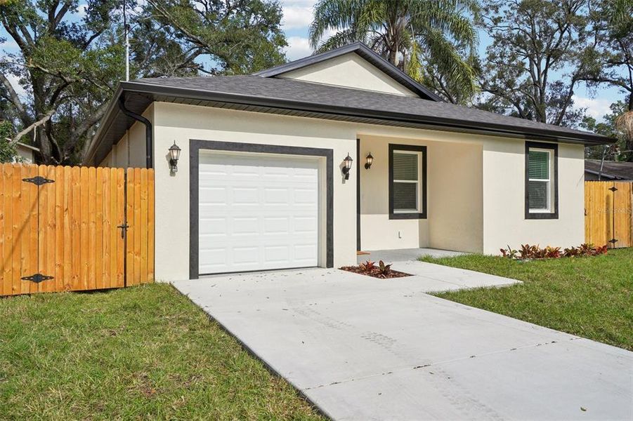 Front exterior of a new home in , Tampa, FL, highlighting curb appeal (Image 2). Front exterior of a new home in , Tampa, FL, highlighting curb appeal (Image 2).