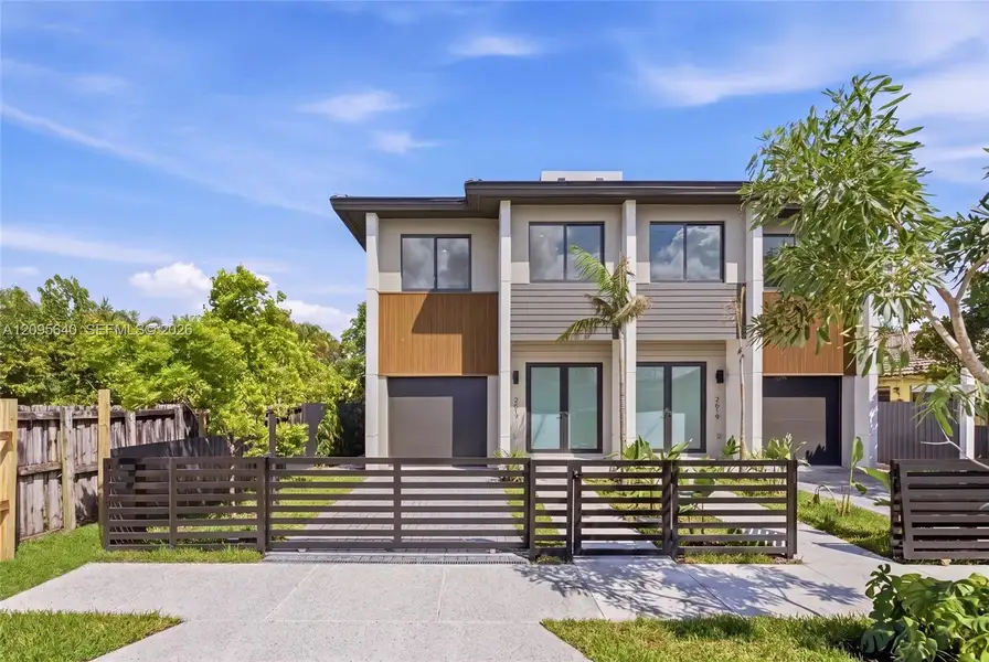 Front exterior of a new home in , Miami, FL, highlighting curb appeal (Image 22).