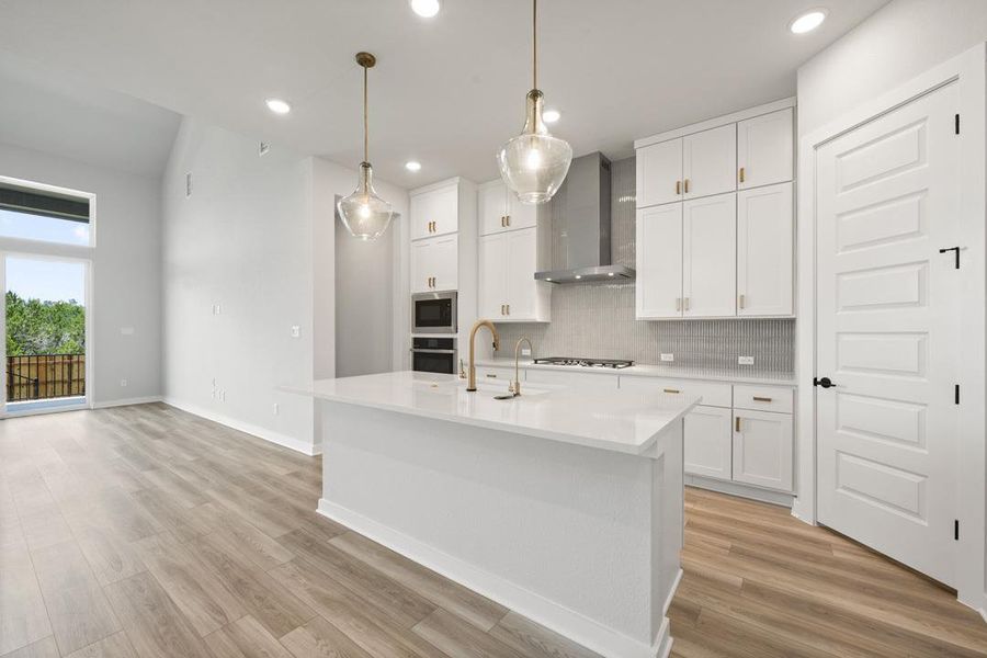 Furnished interior view inside a new home in Heritage, Dripping Springs (Image 6).