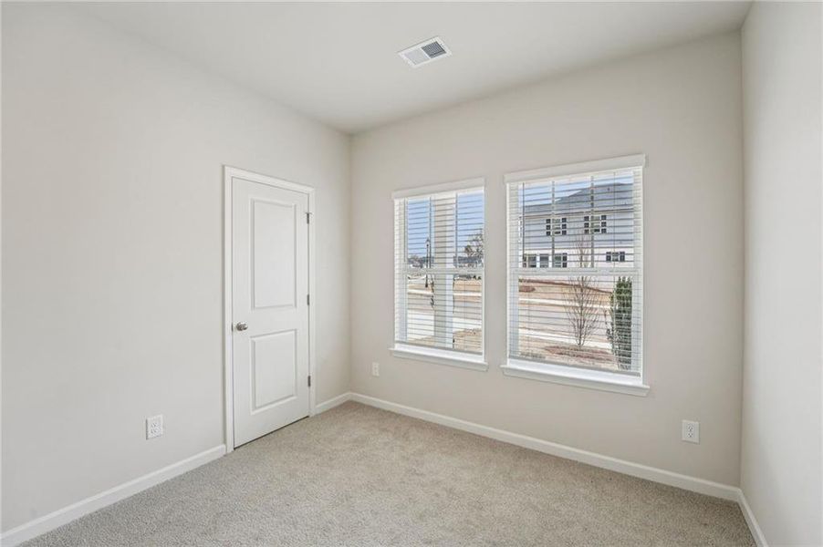 Spacious, unfurnished interior of a new home in Westmont Preserve, Powder Springs (Image 30).