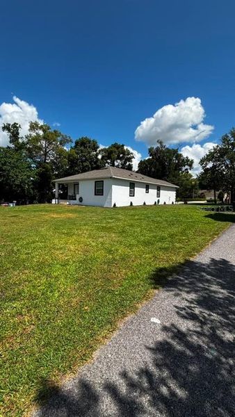 Exterior details and patio area of a home in , Dade City (Image 24).