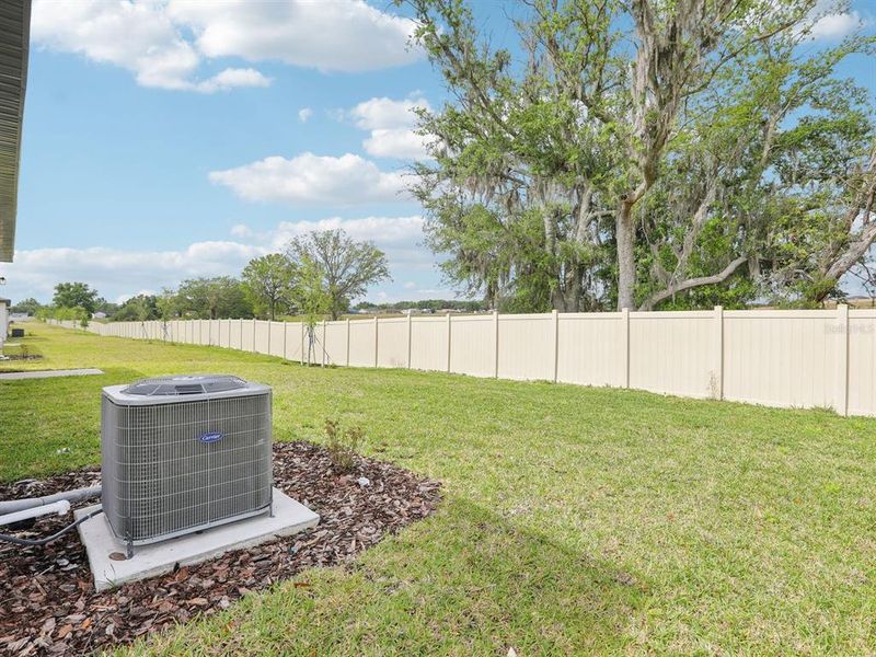 Exterior details and patio area of a home in The Reserve at Van Oaks, Auburndale (Image 24).