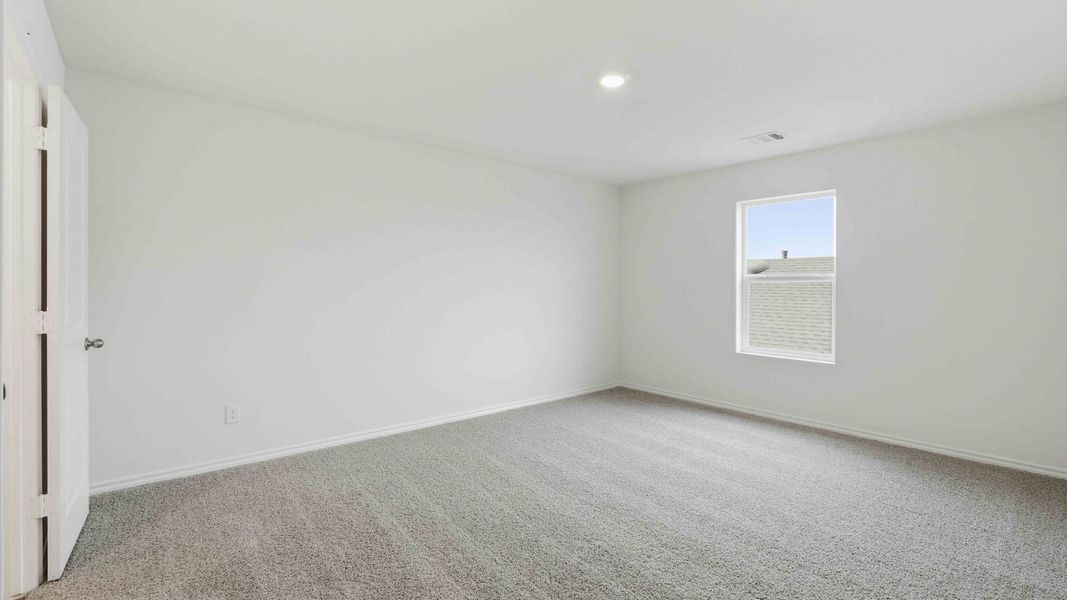Representative unfurnished interior of a home built from the Davis by D.R. Horton in Maplewood Meadows, Forney (Image 13).