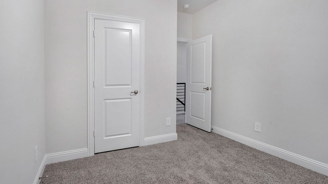 Representative unfurnished interior of a home built from the Derby by D.R. Horton in Mustang Square, Plano (Image 19).