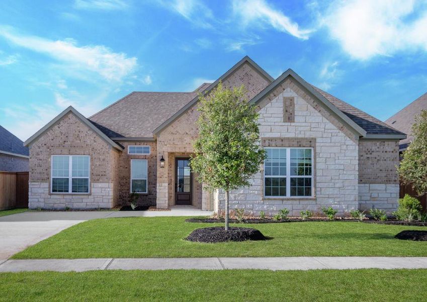 Exterior of the two-story primrose with professionally designed front yard landscaping.