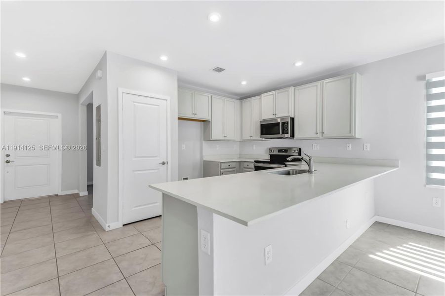 Furnished interior view inside a new home in , Florida City (Image 6).