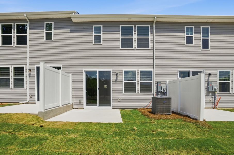 Exterior details and patio area of a home in Stonesummit at Reedy Creek, Charlotte (Image 4).