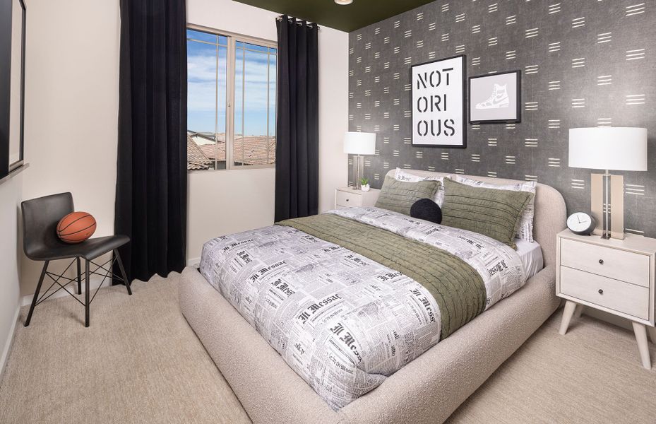 Secondary bedroom with large window in Prato new home construction at Jorde Farms in Queen Creek, AZ Secondary bedroom with large window in Prato new home construction at Jorde Farms in Queen Creek, AZ