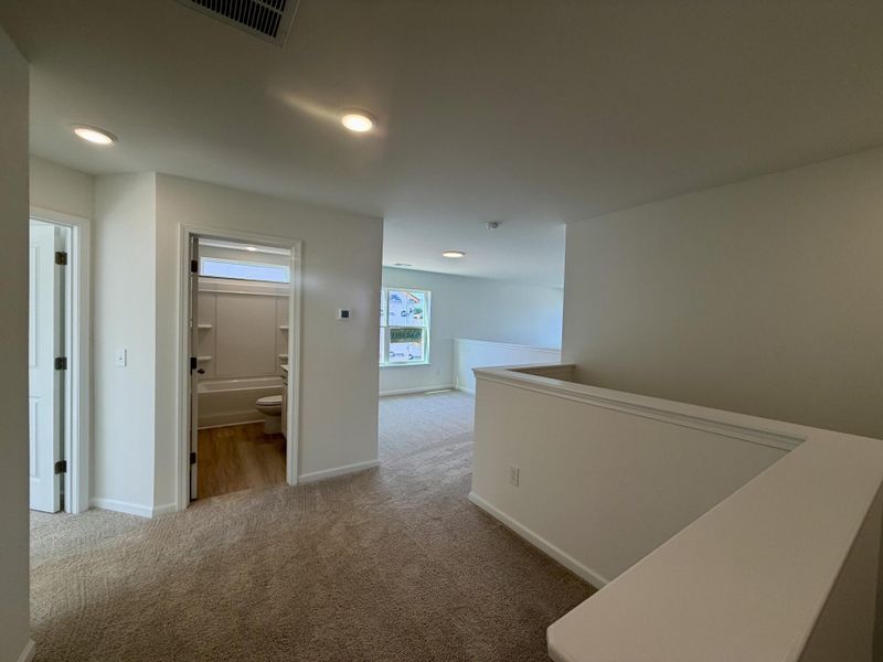 Spacious, unfurnished interior of a new home in Bellevue Townhomes, Greenville (Image 13).