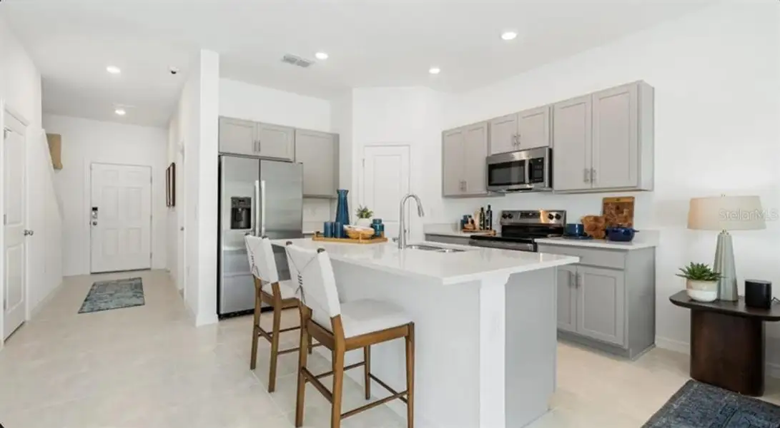 Furnished interior view inside a new home in The Towns at Tiburon, Nokomis (Image 8).