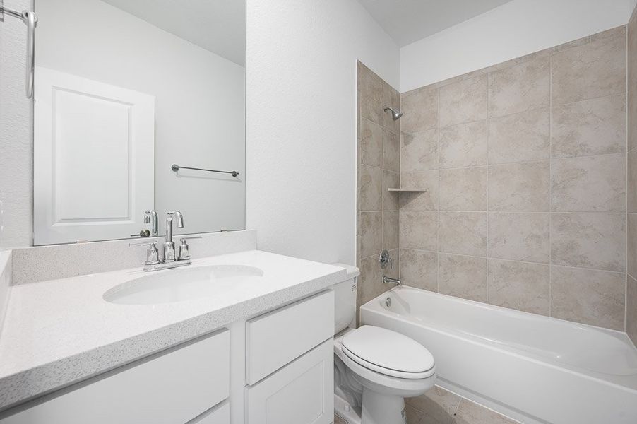 Representative furnished interior of a home built from the Sparrow by Taylor Morrison in Turner's Crossing 50s, Austin (Image 14).