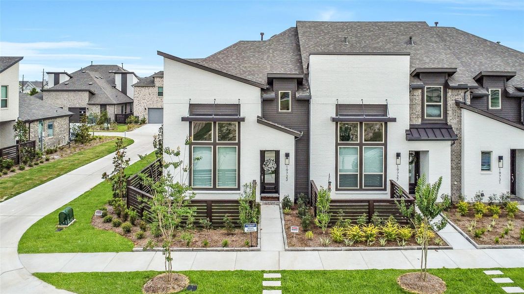 Front exterior of a new home in Bridgeland, Cypress, TX, highlighting curb appeal (Image 20). Front exterior of a new home in Bridgeland, Cypress, TX, highlighting curb appeal (Image 20).