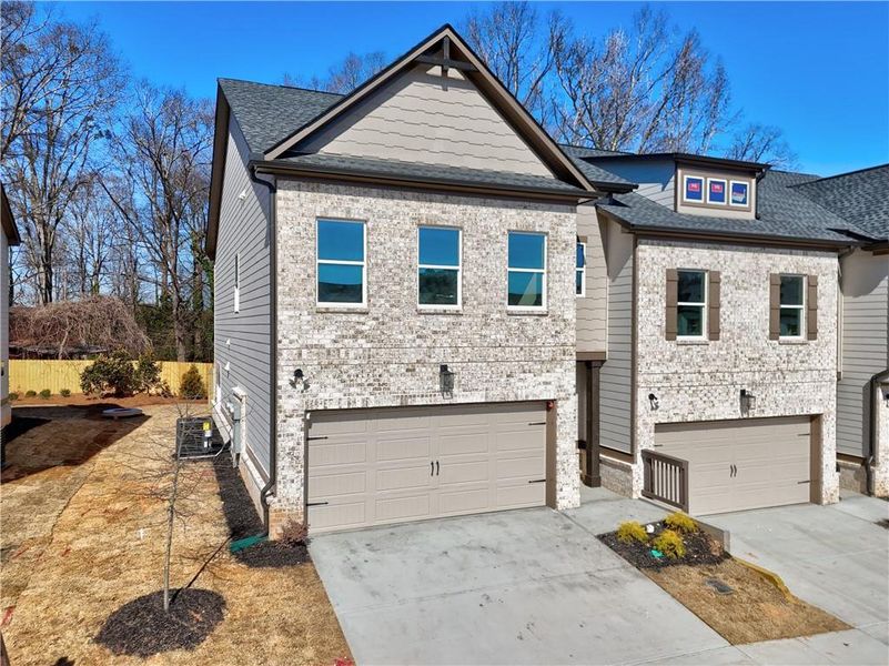 Front exterior of a new home in , Norcross, GA, highlighting curb appeal (Image 19).