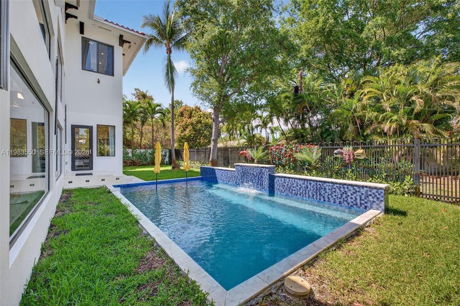 Exterior details and patio area of a home in , Biscayne Park (Image 26).