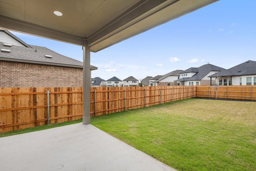 Exterior details and patio area of a home in Arbor Collection at Heritage, Dripping Springs (Image 25).