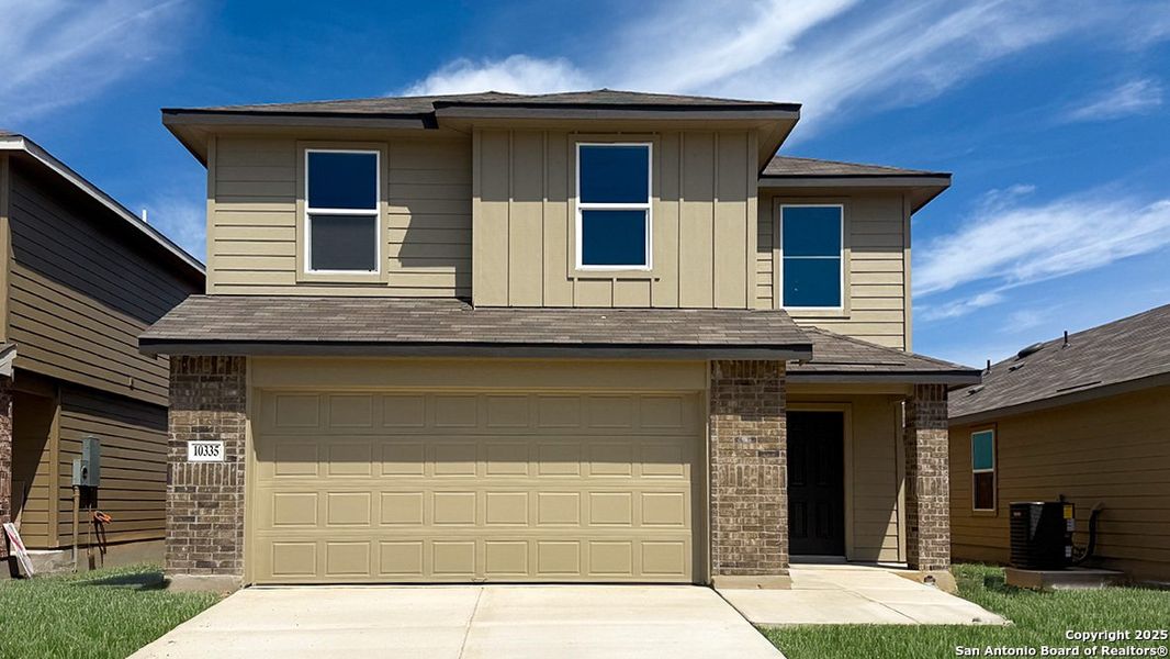 Front exterior of a new home in Sereno Springs, Converse, TX, highlighting curb appeal (Image 1). Front exterior of a new home in Sereno Springs, Converse, TX, highlighting curb appeal (Image 1).