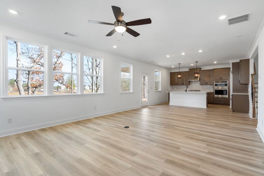 Representative unfurnished interior of a home built from the Ingram by Taylor Morrison in Falls Creek, Flowery Branch (Image 36).