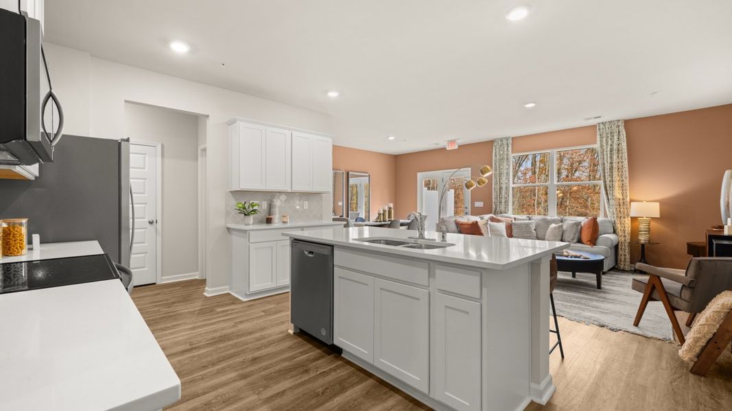 Representative furnished interior of a home built from the Stratford by D.R. Horton in Echo Glen, Stockbridge (Image 6).