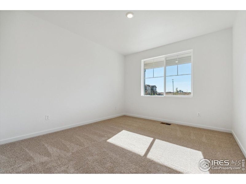 Spacious, unfurnished interior of a new home in Silver Peaks, Lochbuie (Image 15).