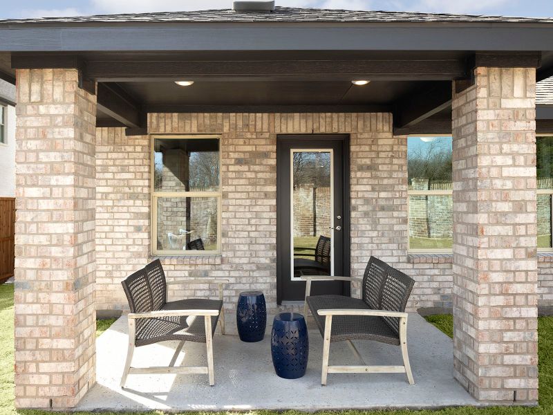 Enjoy the outdoors on the back patio of the Preston