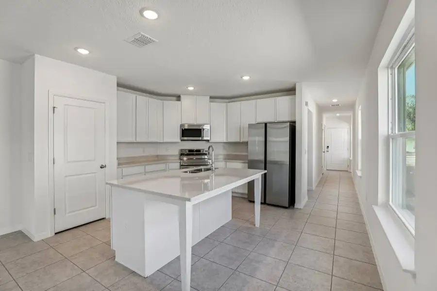 Representative furnished interior of a home built from the Vista by Maronda Homes in Malabar Springs, Palm Bay (Image 6).