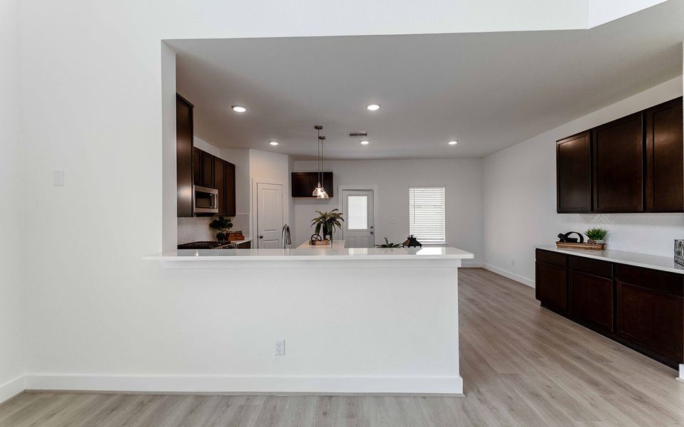 Furnished interior view inside a new home in Massey Oaks, Pearland (Image 4).