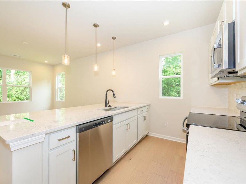 Furnished interior view inside a new home in Fifteen 15 Cannon, Charlotte (Image 7).