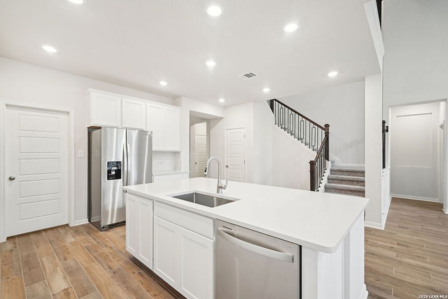 Furnished interior view inside a new home in Estancia Ranch - Classic Series, San Antonio (Image 8).