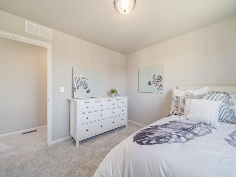 Furnished interior view inside a new home in Thompson River Ranch, Johnstown (Image 17).