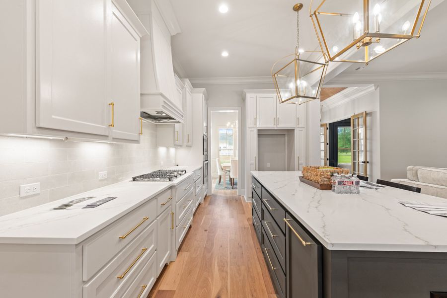 Representative furnished interior of a home built from the The Champagne by Manuel Builders in Chapel Bend, Montgomery (Image 11). Representative furnished interior of a home built from the The Champagne by Manuel Builders in Chapel Bend, Montgomery (Image 11).