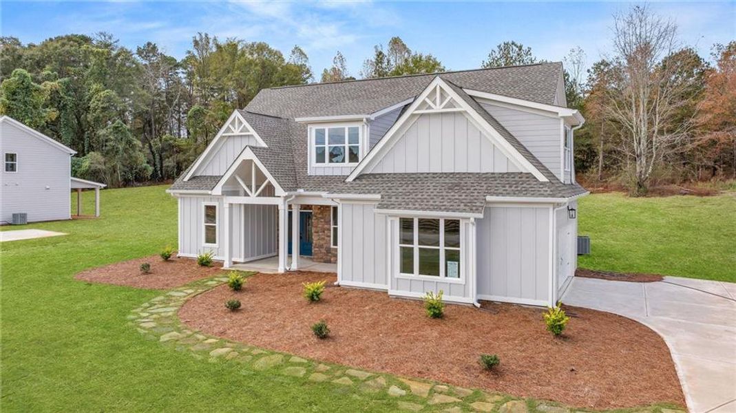 Front exterior of a new home in , Jefferson, GA, highlighting curb appeal (Image 25).