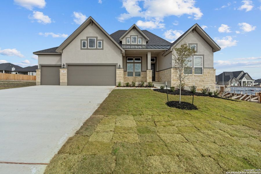 Front exterior of a new home in Potranco Oaks, Castroville, TX, highlighting curb appeal (Image 1). Front exterior of a new home in Potranco Oaks, Castroville, TX, highlighting curb appeal (Image 1).