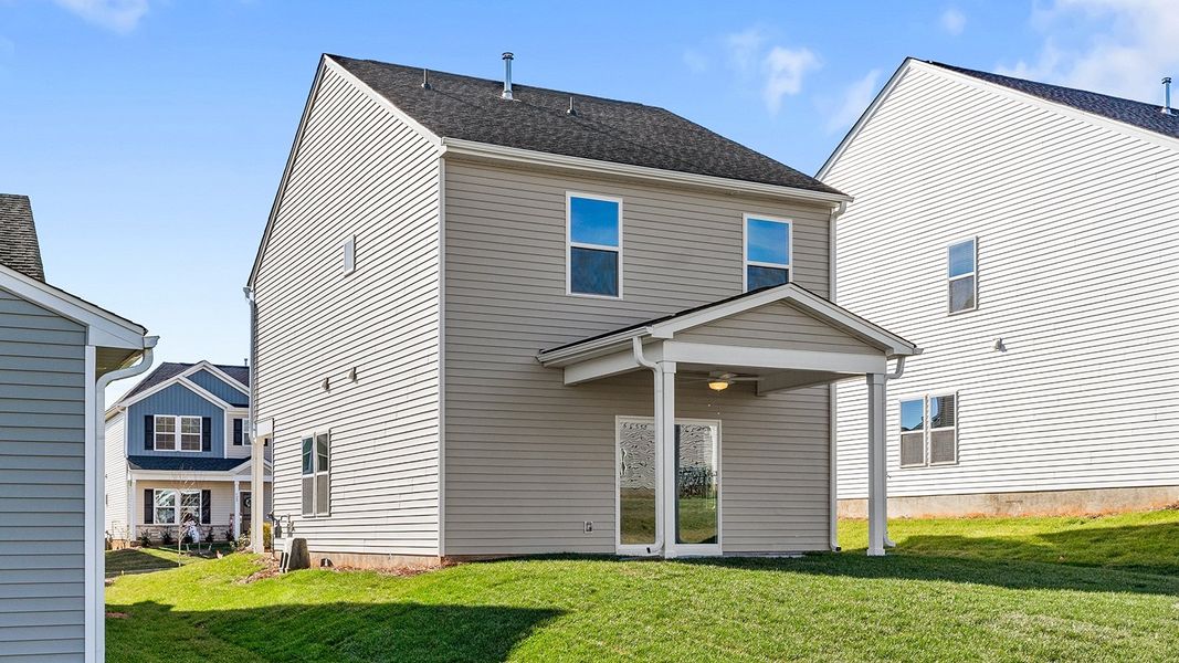 Exterior details and patio area of a home in Hanes Lake, Winston-Salem (Image 4).