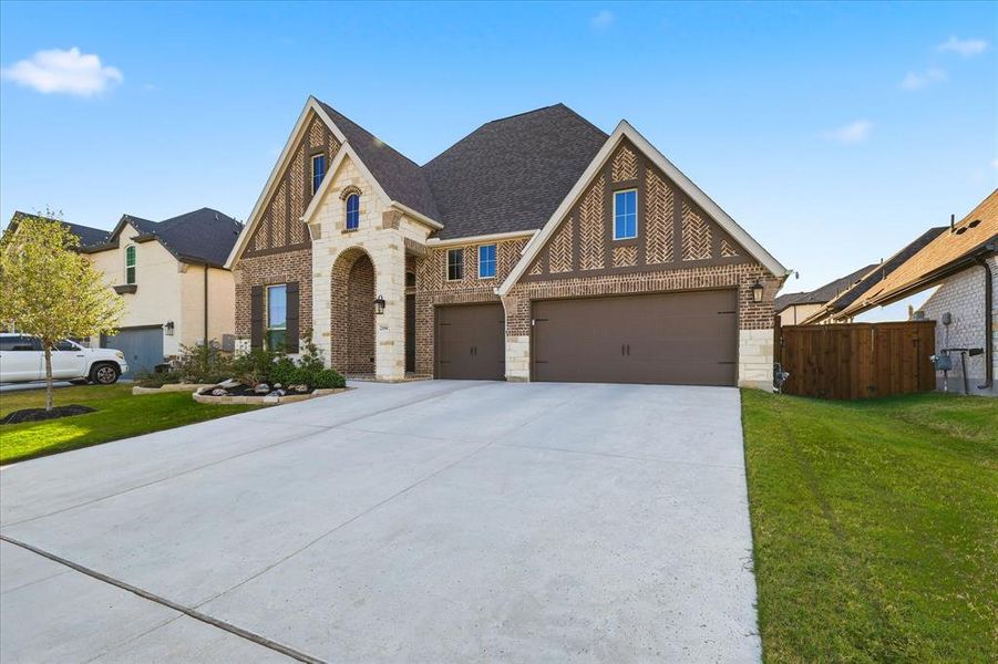 Front exterior of a new home in Watercress 65', Haslet, TX, highlighting curb appeal (Image 2). Front exterior of a new home in Watercress 65', Haslet, TX, highlighting curb appeal (Image 2).