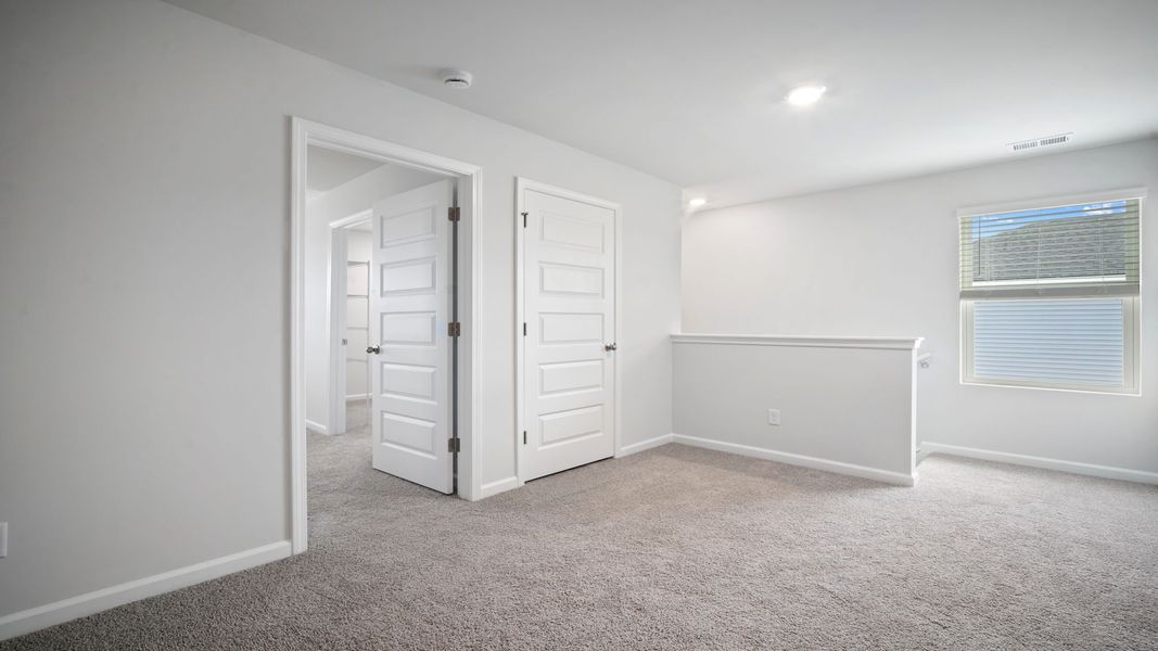 Spacious, unfurnished interior of a new home in The Lakes at North Glynn, Brunswick (Image 19).