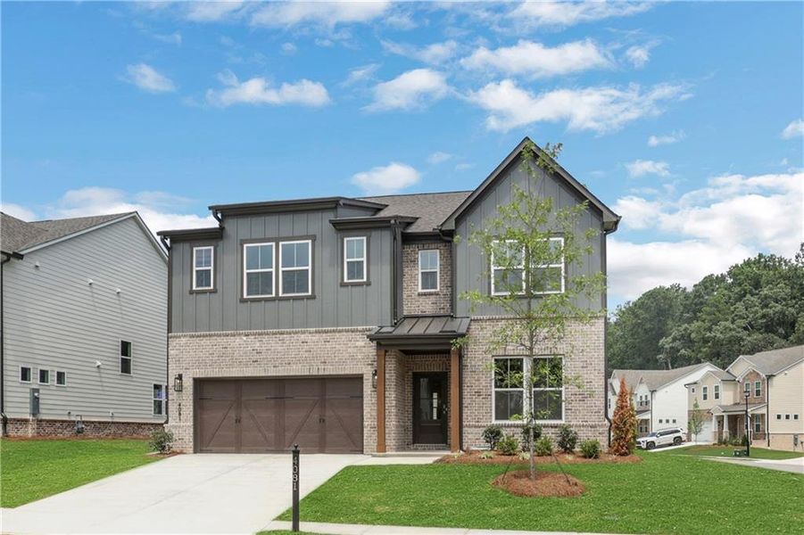 Front exterior of a new home in The Paddocks at Doc Hughes, Buford, GA, highlighting curb appeal (Image 23).