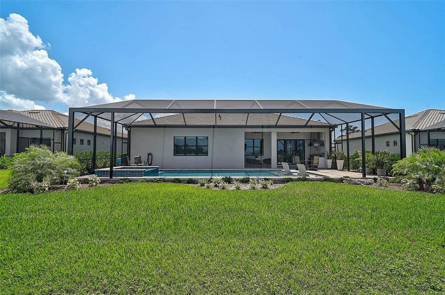 Front exterior of a new home in , Nokomis, FL, highlighting curb appeal (Image 24). Front exterior of a new home in , Nokomis, FL, highlighting curb appeal (Image 24).